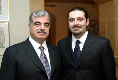 Ex-Lebanese PM Saad al-Hariri, (right) with his father, 